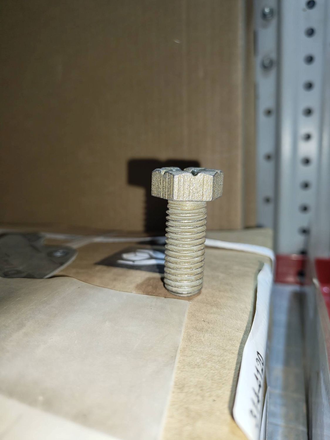 Болт 09409907 Terex